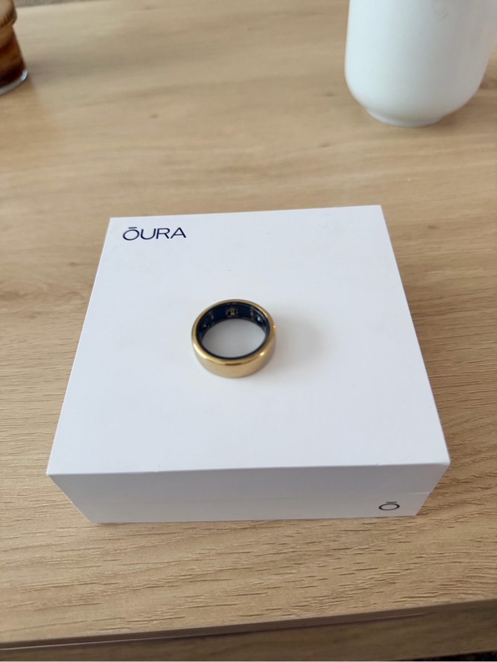 Oura Gold and Black Smart Ring - Polished Gold Exterior